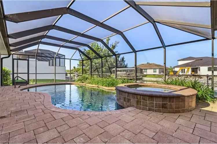 Buy Gulf Access Pool Home in NW Cape Coral with 3 Car Garage