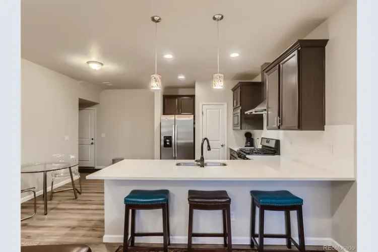 Buy Townhome in Longmont with 3 Bedrooms, Outdoor Space, and Modern Features