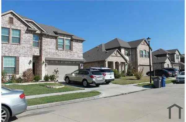 Rent Spacious 5 Bedroom Apartment in Forney with Updated Kitchen and Large Backyard