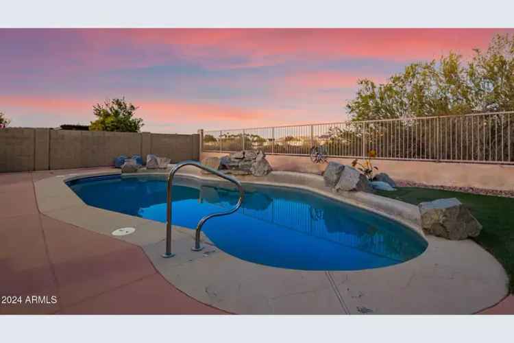 Buy 4 Bedroom Home in Estrella Mountain Ranch with Heated Pool and Mountain Views