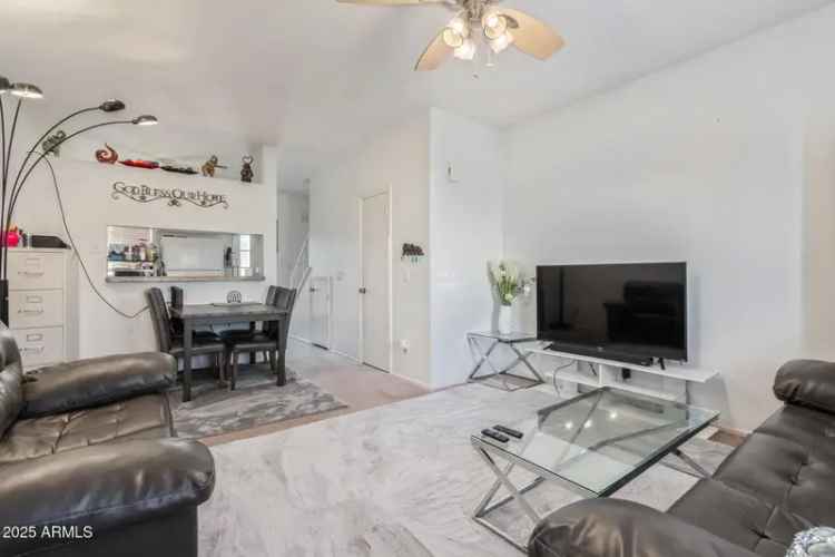 Buy Townhome in Sunstone 2 with Updated Kitchen and Private Patio