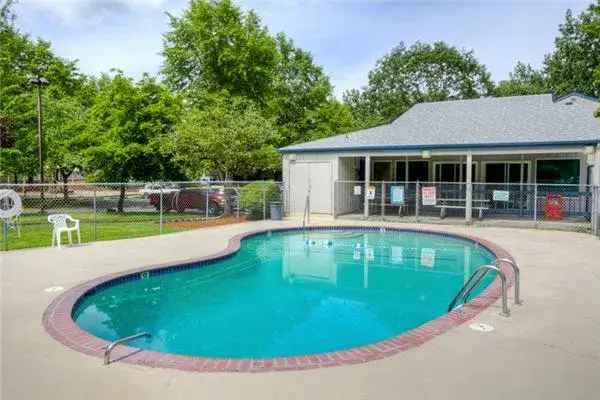 Rent Apartments at Woodland Creek with Pools and Playgrounds