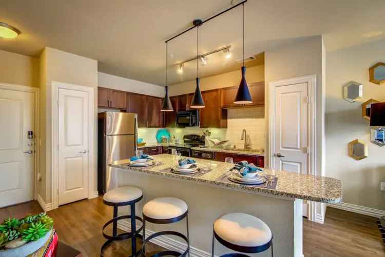 Rent modern apartments at Keller Springs with resort-style amenities