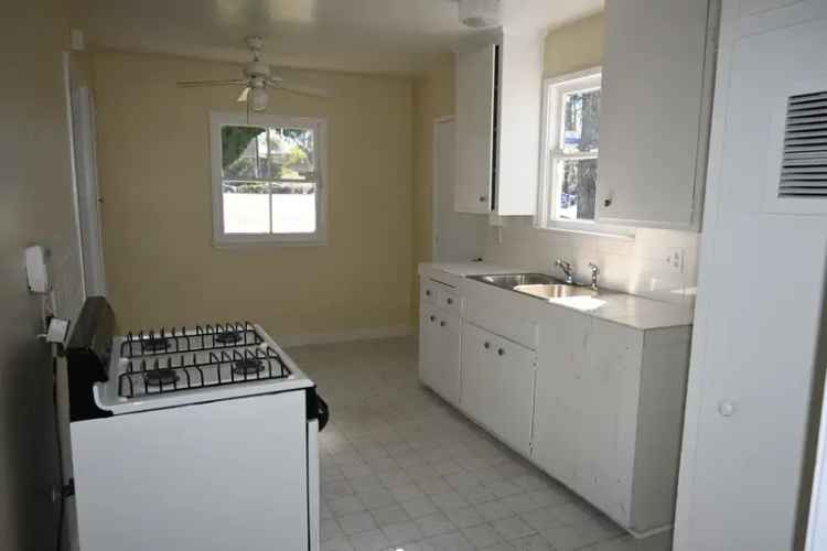 Rent Home with Backyard Near Woodly Park and Newly Painted Interiors