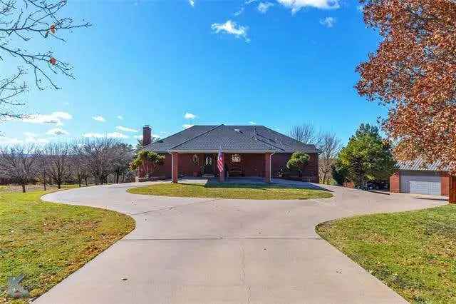 Buy Custom Home with Pool and Spacious Garage in Beautifully Landscaped Lot