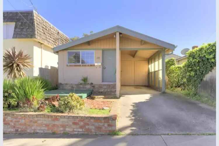 duplex for sale in Pacific Grove with open beam ceilings and patios