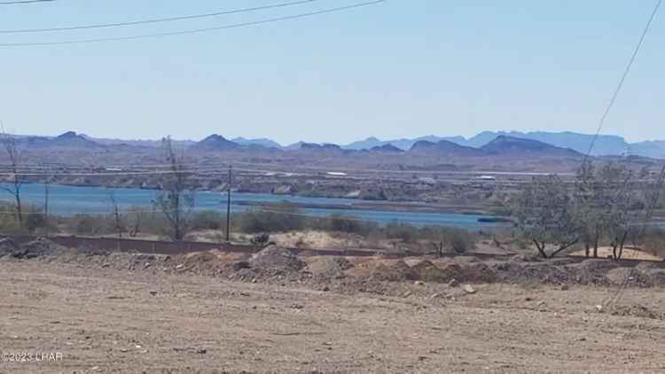 Buy Land with Stunning Lake and Mountain Views Near Golf Course