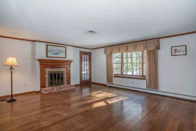 Rent 1800s Schoolhouse Home in Suffield CT with Vintage Charm and Modern Comforts