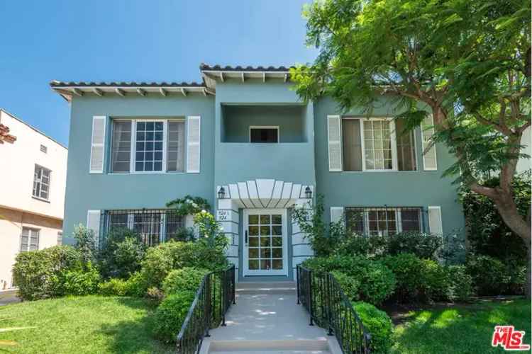 Rent fourplex in Miracle Mile with private yards and balconies