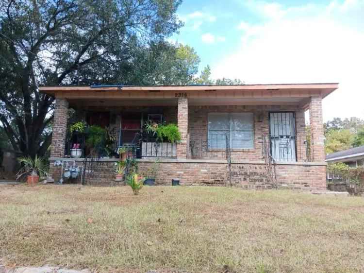 buy duplex in package deal with adjacent lot in fixer upper condition