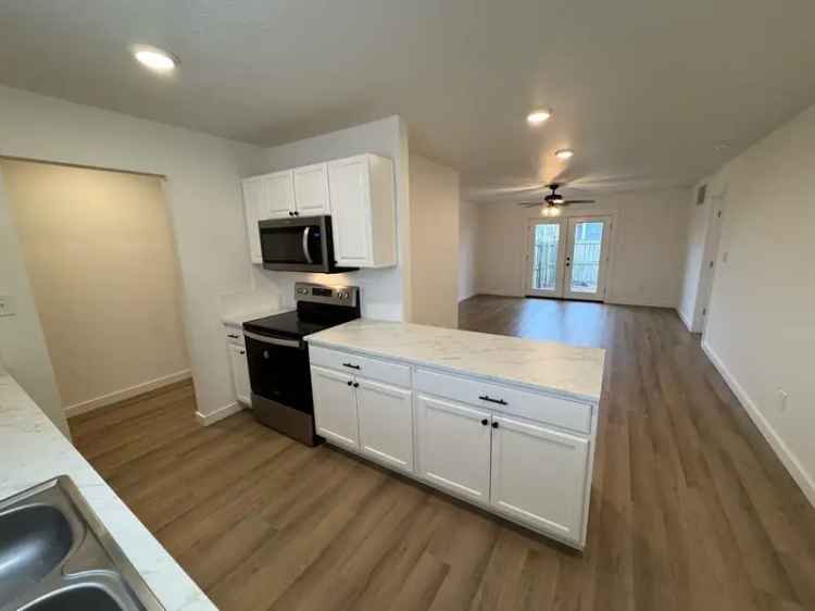 Duplex Apartment Unit for Rent near Downtown Rogers with Backyard