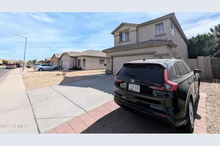 Home for sale in Peoria with four bedrooms and spacious outdoor area