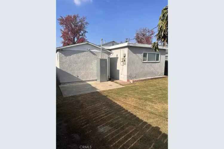 Buy charming refurbished house in North Long Beach with spacious backyard