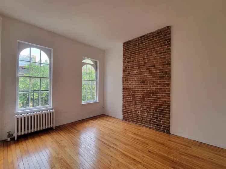 Rent Apartment Unit with Renovated Kitchen and Bathroom on Tree-Lined Street