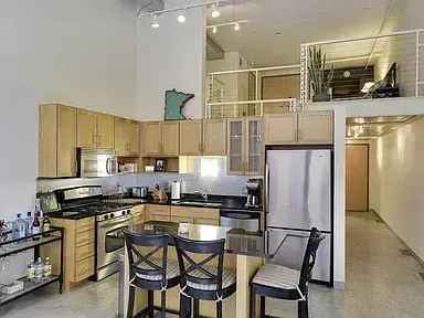 Rent Apartment Unit with Den and Parking in Downtown Mill District