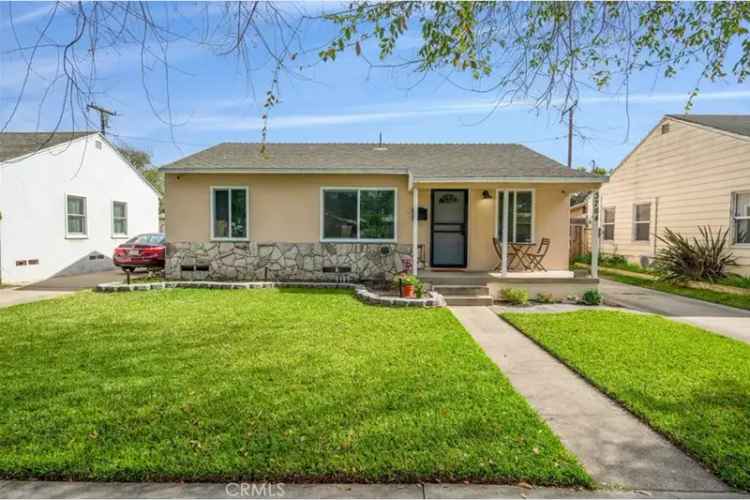 Buy single-family home in Long Beach with spacious backyard and garage