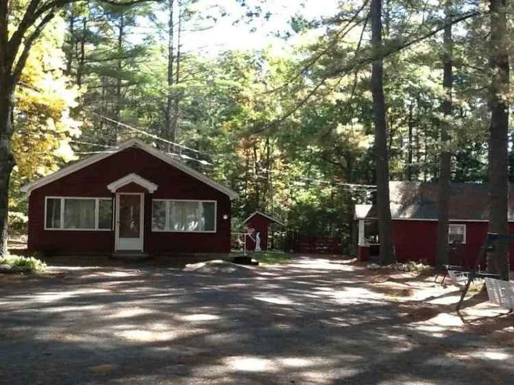 Buy Waterfront Property with Cottages on Loon Pond in Serene Setting