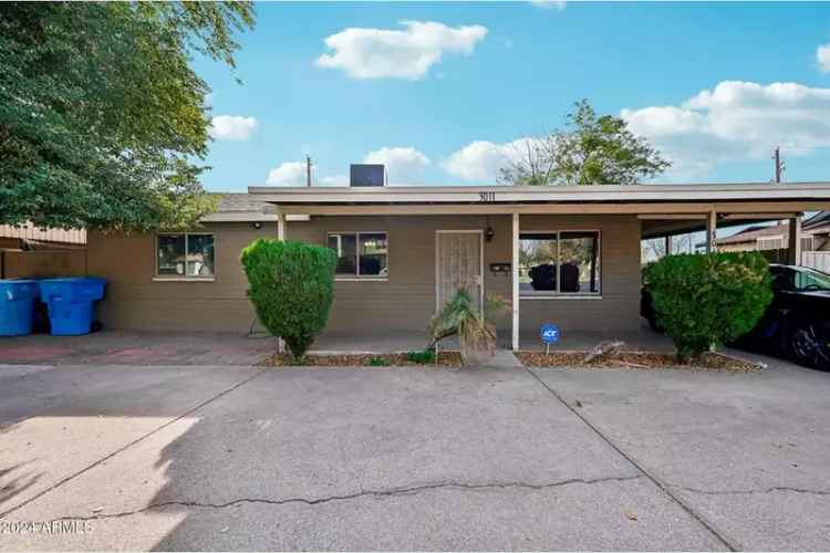 Investor Special Buy Open Concept Home Close to GCU with RV Gate