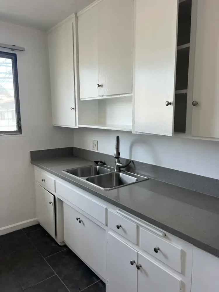 Rent Remodeled Apartment Unit with 1 Bedroom in a Secure Community