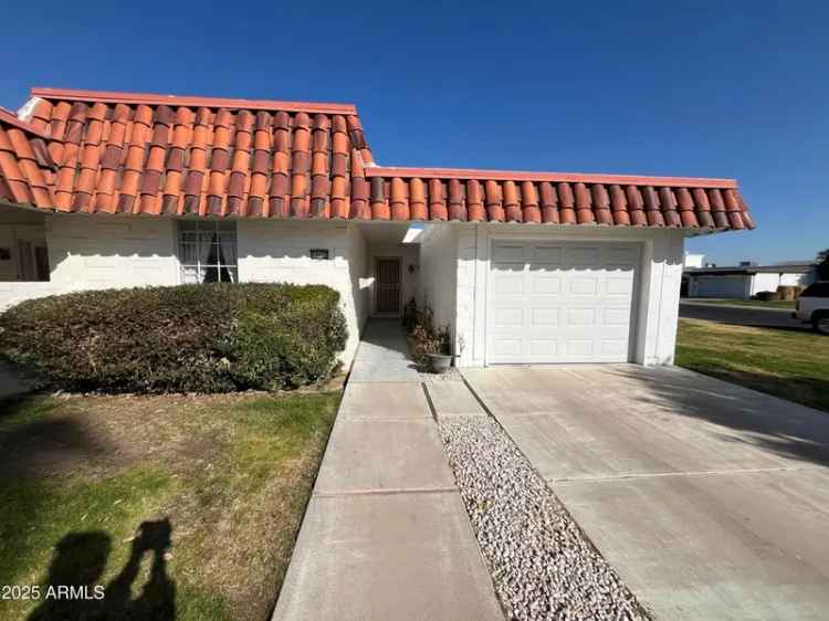 Buy Beautiful Home in Sun City with Spacious Floor Plan and Cozy Arizona Room