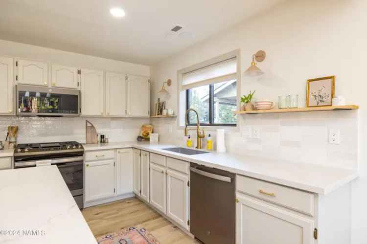 Buy Renovated Home in University Heights with Modern Kitchen and Spacious Backyard