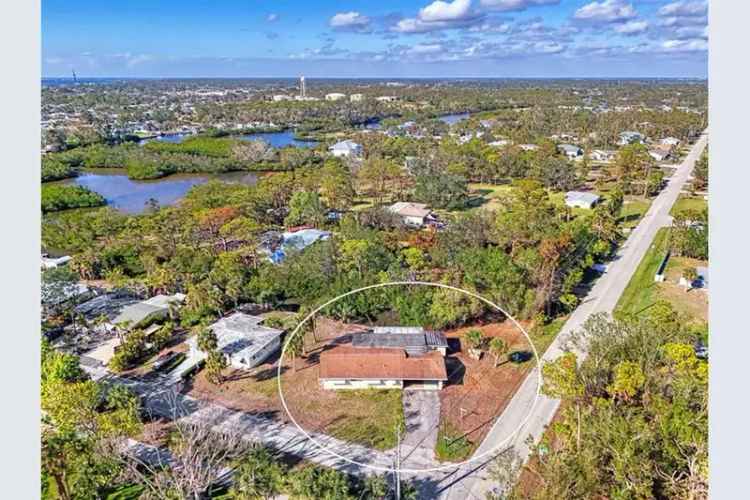 Buy waterfront home in Sarasota County with beach access and sunroom