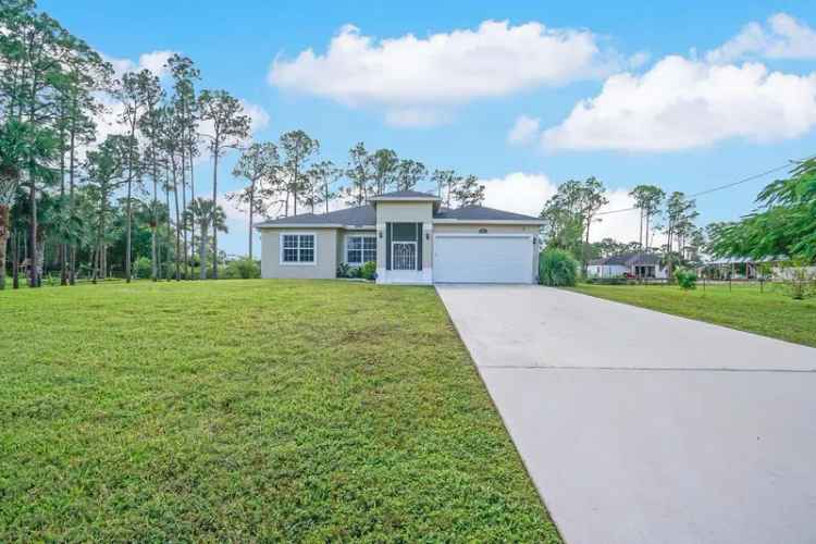 Buy Single Family Home in The Acreage FL with Stunning Features