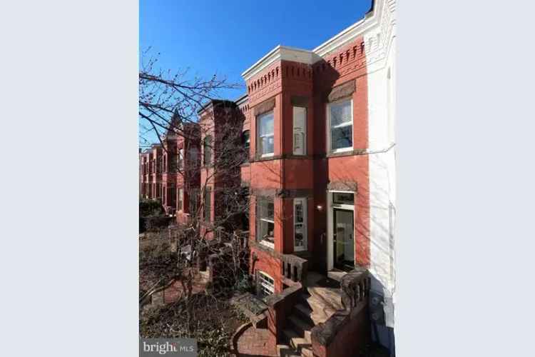 Buy Victorian house near Lincoln Park with private patio and English basement