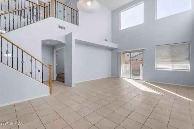 Buy Spacious Two-Story Home in Maricopa with Community Amenities