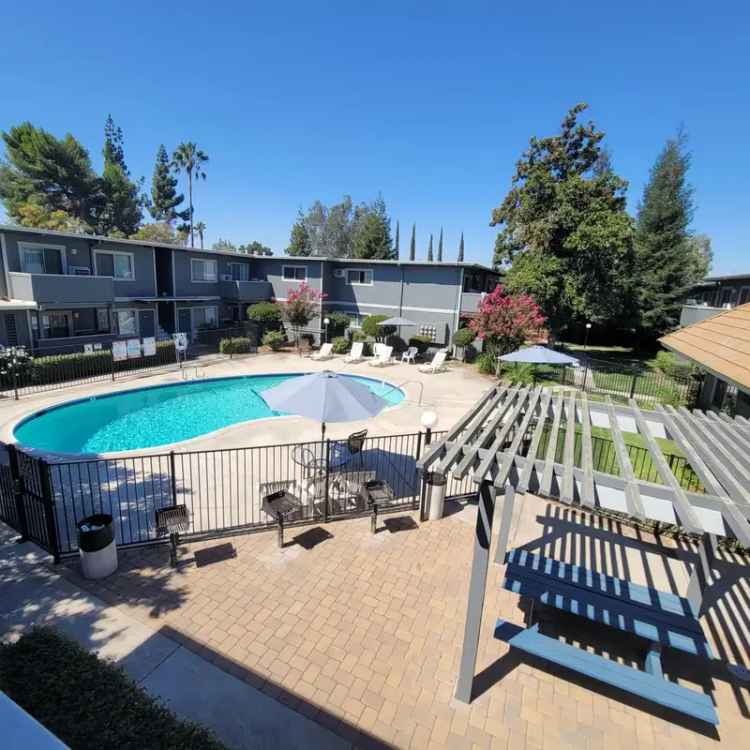 Rent Apartments at Pine Grove Terrace in Modesto with Pool Access