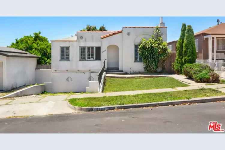 Investor Delight Buy Spanish Style Home in View Heights with Yard