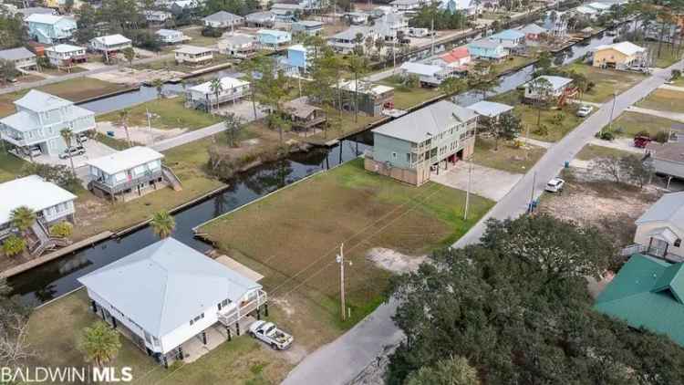 Waterfront Lot For Sale in Gulf Shores with Canal Access and Beach Proximity