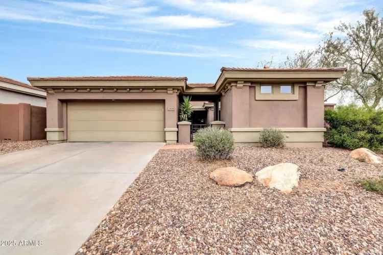 Buy house with pool in Anthem Country Club with golf and mountain views