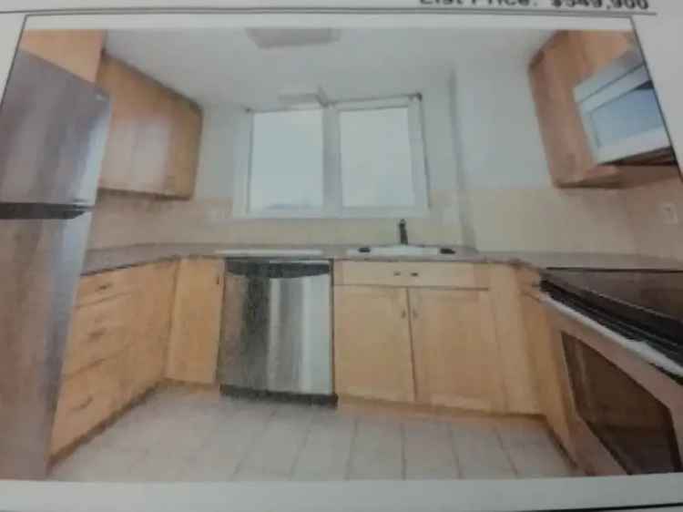 Rent Apartment Unit with Beautiful Hardwood Floors and New Kitchen