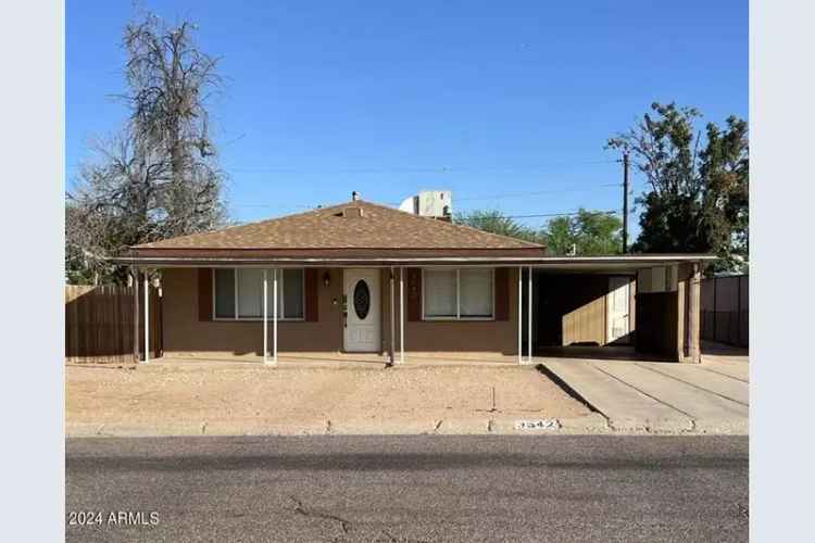 Buy House in Phoenix With Four Bedrooms and Spacious Backyard