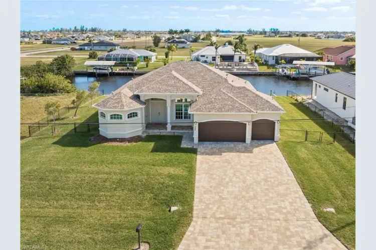 Buy Cape Coral Home with Pool and Boat Dock Featuring Stunning Water Views