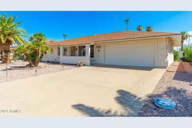 Buy Updated Home in Sun City West with Modern Features and Spacious Backyard