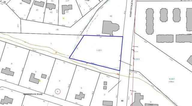 Acres for sale on Honeysuckle Road with drainage easements