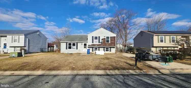 Buy Spacious Split Level Home with Rear Deck and Off Street Parking