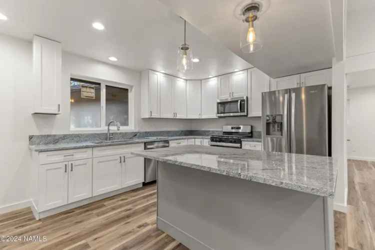 Buy Residence in Paradise Hills with Modern Upgrades and Gourmet Kitchen