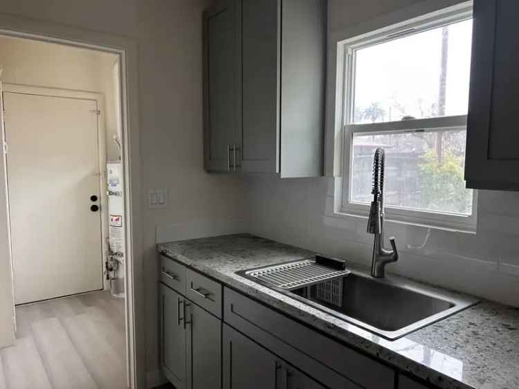 Rent Apartment in Newly Remodeled Duplex with Private Yard Near Amenities