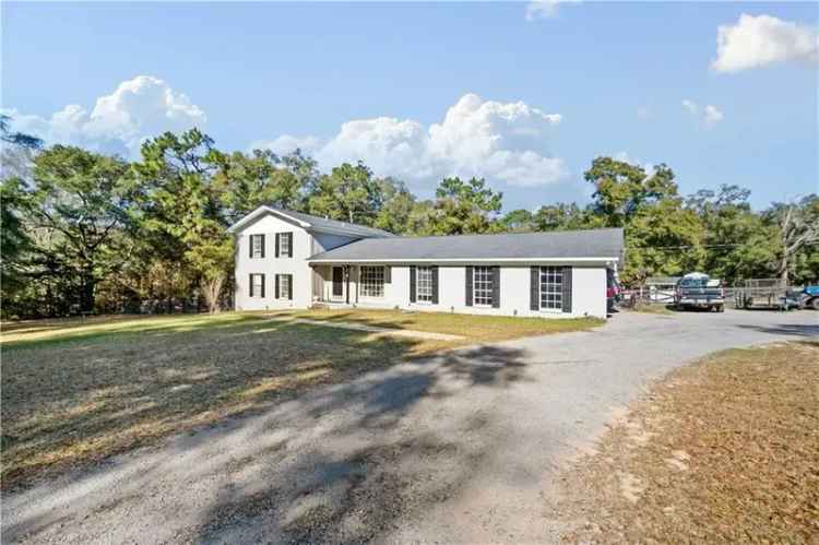 Buy spacious split-level home with pool in Mobile Alabama