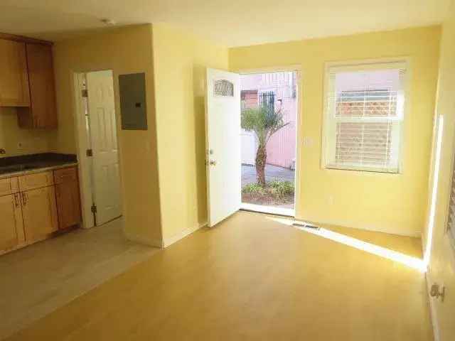 Rent Bright Quiet Apartment Unit with Modern Kitchen in Gated Community