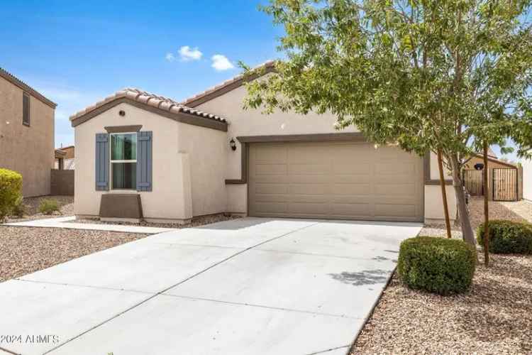 Buy House in Buckeye with 3 Bedrooms, Open Floor Plan and Landscaped Backyard