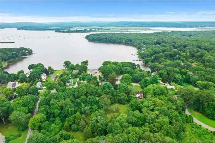 Buy Antique Colonial Property with 12.69 Acres in Essex Village