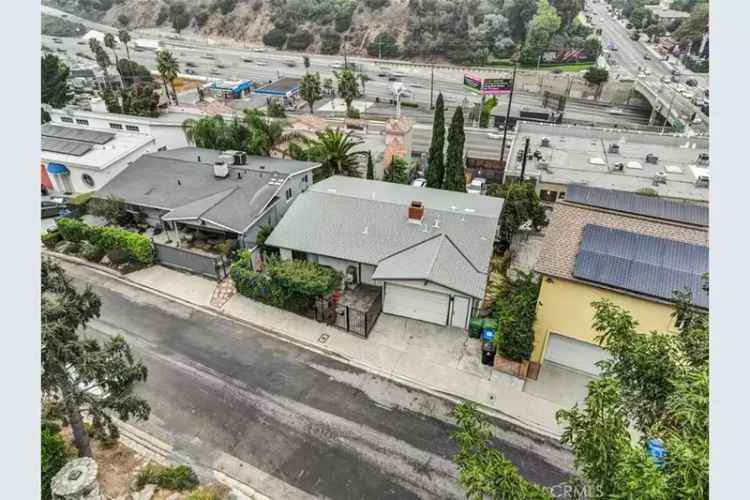 Buy charming home in Hollywood Hills with 4 bedrooms and studio features