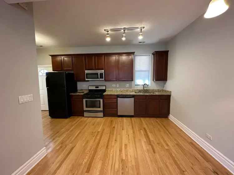 Condo for Rent in Logan Square with Updated Kitchen and Outdoor Space