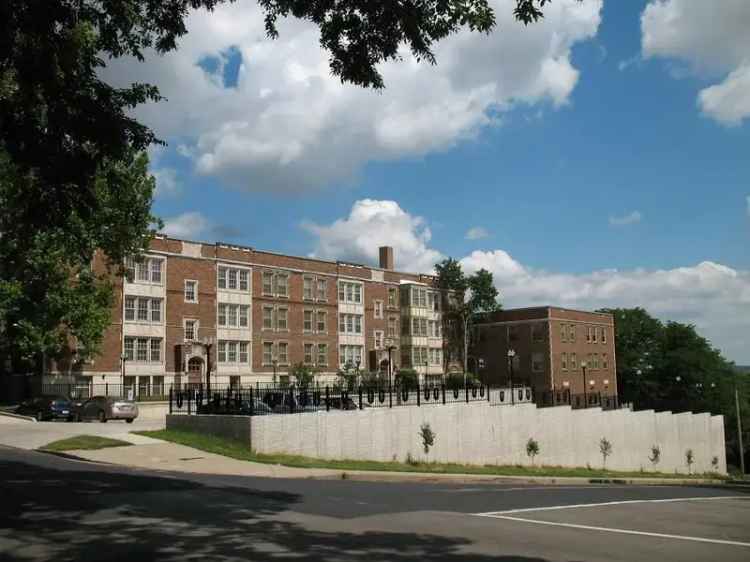 Rent 2 Bedroom Apartment with Balcony in Stately Historic Building