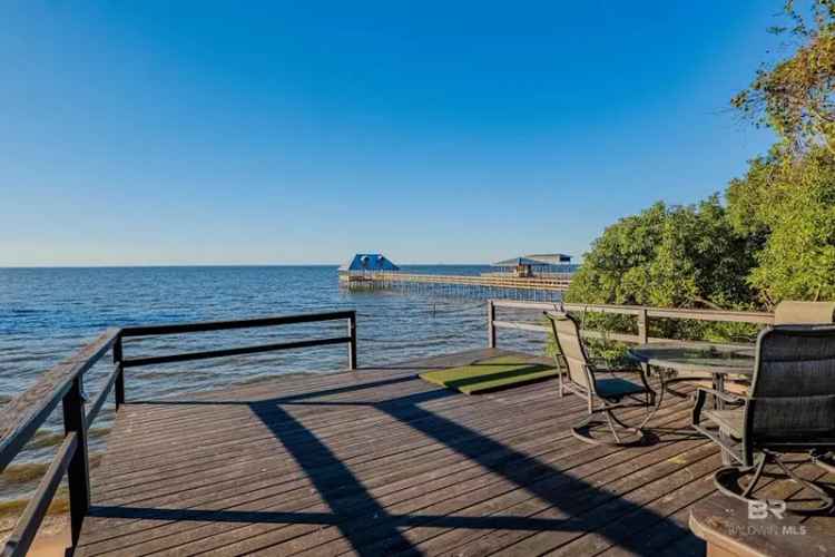 Buy waterfront house Mobile Bay with guest cottage and modern upgrades