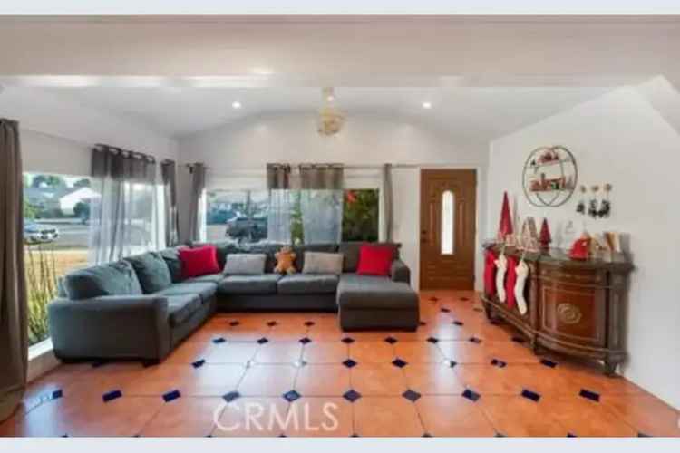 Buy Multi-Unit Home in Van Nuys with Spacious Family Den and Courtyard